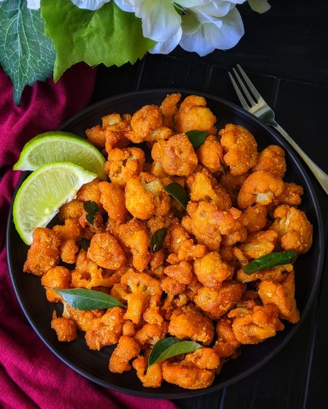 This Gobi 65 or Cauliflower 65 is a delicious veg appetizer in which the spicy layered cauliflower are fried to crisp and golden and tossed in a flavored spice that makes it better than restaurant one! Gobi Fry, Gobi 65, Veg Appetizers, Flavored Rice, Green Chutney, Fried Cauliflower, India Food, Cauliflower Recipes, Curry Leaves