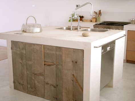 Roxane Beis kitchen, stainless steel dishasher, reclaimed wood doors, white solid plaster, white cement render | Remodelista White Cement Kitchen, Cement Kitchen, Contemporary Kitchen Inspiration, Concrete Kitchen Island, Narrow Kitchen Island, Country Kitchen Island, Island With Stove, Kitchen Island With Stove, Green Kitchen Island