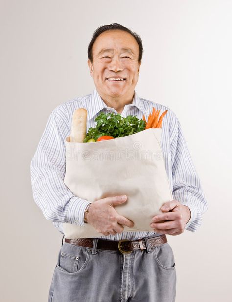 Man holding grocery bag full of fresh fruits. Confident man holding grocery bag #Sponsored , #SPONSORED, #Ad, #grocery, #Man, #Confident, #bag Holding Grocery Bag Reference, Holding Bag Pose Reference, Holding Bag Reference, Bill Gets, Confident Man, Bakery Bags, Vegetable Bag, Fresh Products, Fresh Groceries