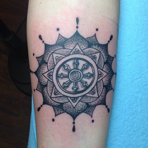 Love this dharma wheel Dharma Wheel Tattoo Design, Dharma Wheel Tattoo, Buddhist Symbol Tattoos, Buddhism Tattoo, Mandala Tattoo Back, Mandala Tattoos For Women, Zen Tattoo, Sky Tattoos, Wheel Tattoo