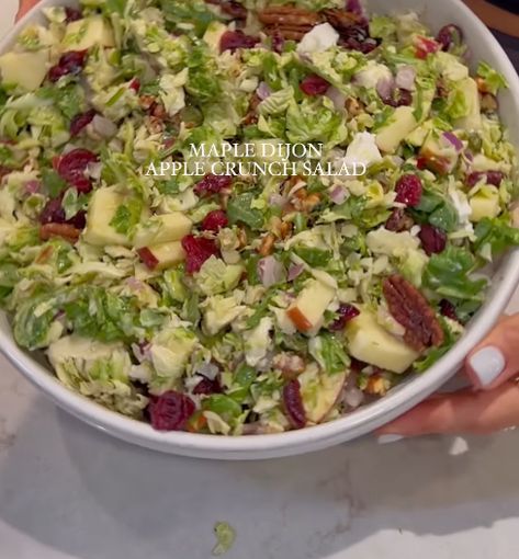 ingredients: - 1 cup of shredded brussel sprouts - 1/2 cup chopped arugula - 3 medium apples, diced - 1/2 cup diced red onion - 1/3 cup candied pecans - 1/3 cup craisins - 1/2 cup crumbled goat cheese add everything to a large serving bowl, then top with the dressing maple dijon dressing - 1/3 cup plain unsweetened cashew yogurt - 2 tbsp dijon mustard - 4 tbsp maple syrup - 2 tbsp olive oil - 2 tsp each sea salt, garlic powder, onion powder Maple Dijon Apple Crunch Salad, Maple Dijon Dressing, Apple Crunch, Crumbled Goat Cheese, Cashew Yogurt, Crunch Salad, Dijon Dressing, Shredded Brussel Sprouts, Candied Pecans