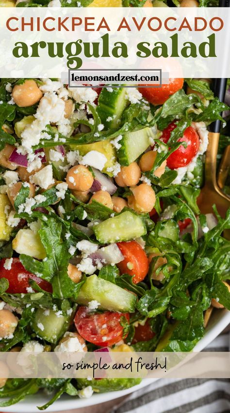 So much color and fresh simple ingredients in this easy Arugula, Chickpea and Avocado Salad with feta. Only about 15 minutes to prep and full of flavor! Juicy tomatoes, crunchy cucumbers, fresh herbs and more make this so fresh and delicious! It will be a new favorite way to get your veggies in! Chickpea And Avocado Salad, Chickpea And Avocado, Chickpea Avocado Salad, Chickpea Avocado, Salad With Feta, Avocado Tomato Salad, Juicy Tomatoes, Arugula Salad, So Fresh