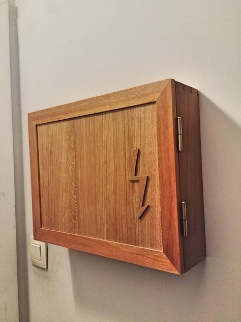 Electric Cabinet Cover, Panel Box Cover Ideas, How To Hide Electrical Box On Wall, Hidden Electrical Panel, Fuse Box Cover Ideas, Circuit Breaker Cover, Hide Electrical Panel, Cover Electrical Panel, Fuse Box Cover