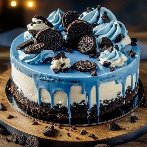 Get ready to indulge in this stunning Blue Velvet Oreo Cheesecake! This show-stopping dessert combines the rich flavors of blue velvet cake, creamy cheesecake, and a delightful Oreo crust. Perfect for any celebration or a special treat! 💙 Blue Velvet Oreo Cheesecake, Blue Oreo Cake, Blue Velvet Cake, Oreo Cheesecake Recipe, Blue Velvet Cakes, Birthday Cheesecake, Oreo Cheesecake Recipes, Oreo Crust, Wedding Anniversary Cake