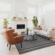 Chic Room Inspirations for Black and White Rugs | Ruggable Blog Floor Living, Affordable Area Rugs, Black Floor, Chic Home Decor, New Living Room, Couches Living Room, Chic Home, White Rug, Home Decor Tips