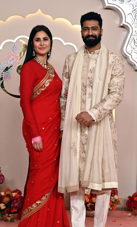 MUMBAI, INDIA - JULY 12:   Indian actor Vicky Kaushal and wife Katrina Kaif attended the Wedding ceremony of Anant Ambani and Radhika Merchant at the Jio World Convention Centre, BKC on July 12, 2024 in Mumbai, India.  (Photo by Raju Shinde/Hindustan Times via Getty Images) Indian Wedding Outfits Guest, Wedding Guests Photos, Ambani Wedding, Radhika Merchant, Indian Wedding Clothes For Men, Anant Ambani, Draping Styles, Vicky Kaushal, Mens Wedding Attire