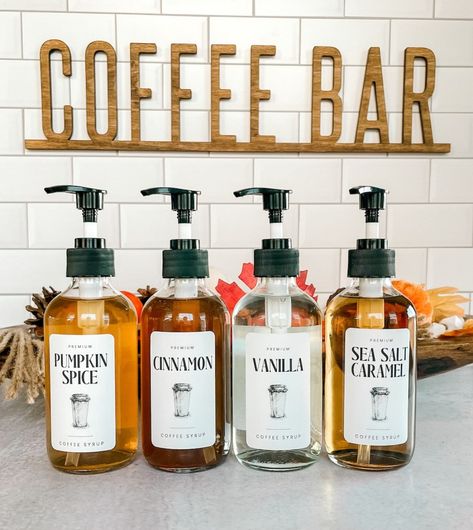 Coffee Bar Ideas Syrup, Coffee Syrups Display, Coffee Syrup Dispenser Ideas, Coffee Syrup Organization, Coffee Syrup Dispenser, Coffee Syrup Labels, Organizing Coffee Syrups, Coffee Syrup Bottles With Pump, Diy Coffee Drinks