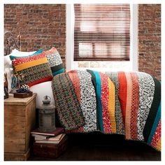 Free spirited, untamed, rustic yet chic, Lush Décor's Boho Stripe 3pc Quilt Set is a perfect piece of modern time creativity. The stripe quilt is 100percent cotton and soft to the touch. The bright and colorful bohemian style front design is ideal for those seeking to decorate their bedroom with the trendy boho look. Our Boho Stripe 3pc Quilt Set is reversible and features a geometric pattern on the back. The colors are gender neutral and ideal for school age kids through to adults. This pattern Bohemian Bedding Sets, King Quilt Sets, Orange Bedding, Bohemian Bedding, Striped Quilt, Lush Decor, Bohemian Colors, King Bedding Sets, Quilted Sham