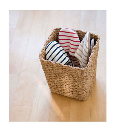 If you store small items on a shelf, try corralling them into a bin or basket, which you can treat as a drawer. For instance, stash your collection of tea boxes, DVDs, or slippers in a basket and access it as needed. The basket lets you see all the contents at the same time as well as maximize use of the entire space. Flip Flop Storage, Pot Rack Hanging, Spray Foam Insulation, Kitchen Ceiling, Spray Foam, Tea Box, Rattan Basket, Good Housekeeping, Neat And Tidy