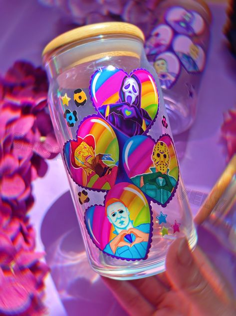 This listing is for ONE Iridescent LF Spooky Dudes 16oz Cup. All cups come with bamboo lid and straw. You can also upgrade your straws with NEW iridescent glass straws in a separate listing. Follow me on IG for shop updates! @shopcosmiclovely Subscribe to my newsletter for exclusive coupons! Spooky Cup Ideas, Lisa Frank Tumbler, Holographic Glass Cups, Funky Glass Tumbler, Spooky Tumbler Cup, Halloween Libbey Cups, Glass Straws, Diy Resin Crafts, Hallows Eve