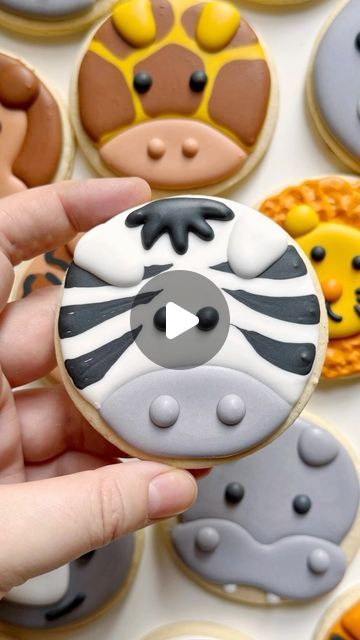 Grace Gaylord | Cookie Artist & Content Creator ~ NYC on Instagram: "🦓 What’s the secret to these zebra stripes? You can’t get a sharp edge of the stripe with the piping bag, so you need to use a scribe to pull through the end of the stripe for a sharp end. 🦓  ➡️ Comment SAFARI and I’ll send you a DM (direct message) with the class purchase link!  Want to learn how to make this cookie and more? Check out the Beginner Safari Animals online class:  🦓 1-hour pre-recorded class recording (can take as many times and anytime is convenient) 🐯 78-page workbook (detailed instructions on recipes, links for what you need to you buy, prep work, step-by-step photo instructions for decorating each cookie and much more!) 🦒 Beginner skill level (although all of my classes can be taken by any skill le Decorated Cut Out Cookies, Noah's Ark Decorated Cookies, Animal Cookies Decorated, Wild Animal Cookies, Jungle Cookies Decorated, Zebra Cookies Decorated, Giraffe Decorated Cookies, Zoo Animal Cookies, Safari Baby Cookies