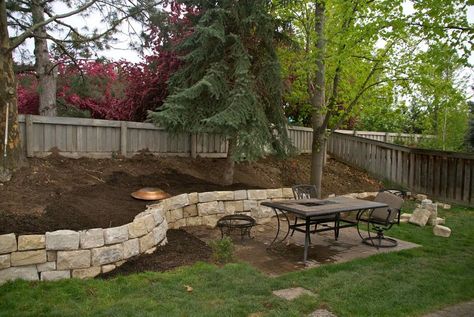 Retaining Walls For Sloped Backyards | sloped hill in our backyard by putting up a sand stone retaining wall ... Retaining Wall Ideas, Backyard Retaining Walls, Sloped Backyard Landscaping, Landscaping A Slope, Landscaping On A Hill, Sloped Yard, Sloped Backyard, Landscaping Retaining Walls, Hillside Landscaping