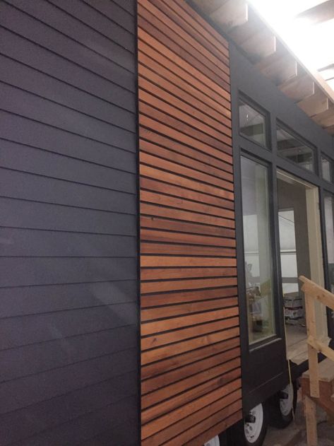 Exterior Facade Design Commercial, Wood Slat Exterior House, Mid Century Modern Garage Doors Exterior Design, Horizontal Wood Slat Wall Exterior, Exterior Accent Wall, Modern Wood Garage Door Panel, Horizontal Wood Cladding Modern Exterior, Exterior Screen, Porch Details