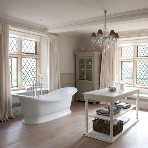 Taking its cue from kitchen design, this clever bathroom layout incorporates an island-style bench ideal for storing towels, toiletries and other bathroom accoutrements. In a larger bathroom, furniture like this also fills the space, which in turn helps it feel more inviting. Our Marlborough tub, which is based on a traditional bateau bath completes the luxurious look. Credit: @simshilditch on Instagram Bathroom Island, Storing Towels, Slipper Bath, Bath Uk, Freestanding Bath, Interiors Magazine, Large Bathrooms, Bathroom Layout, Luxury Bath