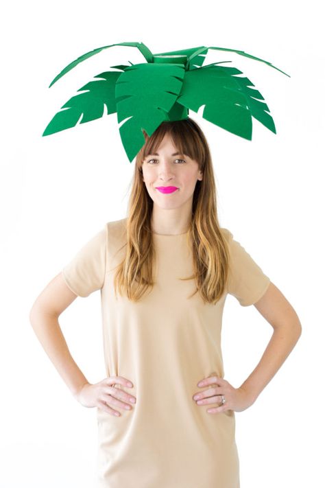 DIY Palm Tree + Beach Ball Costumes | studiodiy.com Palm Tree Costume, Tree Costume Diy, Diy Palm Tree, Tree Halloween Costume, Jungle Costume, Palm Tree Crafts, Beach Costume, Nativity Costumes, Tree Costume