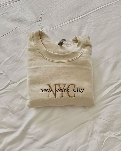 Beige Vintage Nyc Embroidered Crewneck Beige Vintage Nyc Embroidered Crewneck is best Embroidery Clothing for you or gift for friend, family. Shopping more hoodie at here , . The Beige Vintage Nyc Embroidered Crewneck from DreamArtCanada is the perfect addition to any wardrobe. This stylish crewneck is crafted from soft, lightweight cotton and features a classic beige color with vintage NYC embroidery on the front. The high-quality stitching ensures that this piece will last you for years to... Embroidery Clothing, Vintage Nyc, New York Sweatshirt, Sweater Ideas, Embroidery Hoodie, Nyc Design, Color Sweater, Sport Lifestyle, Embroidered Crewneck