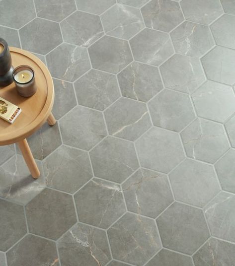 This floor features gray, hexagon-shaped porcelain tile that mimics the appearance and natural veining of genuine stone tile. Hexagon Floor Tiles, Grey Kitchen Tiles, Bathrooms Showers, Hexagon Floor, Hexagon Tile Floor, Hex Tile, Silver Mist, Grey Wall, The Tile Shop