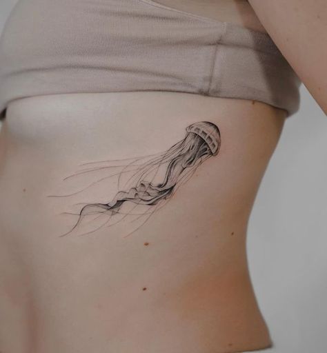 Feminine Jellyfish Tattoo, Medusa Jellyfish Tattoo, Jellyfish Rib Tattoo, Jellyfish Hip Tattoo, Fine Line Jellyfish Tattoo, Hips Tattoo Women, Sea Related Tattoos, Jelly Tattoo, Medusa Animal