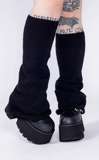 The Black Raven Leg Warmers are perfect for any goth scene. Made from comfy black fabric, they flare out towards the ankle and can be worn higher or lower to fit your look. These leg warmers fit perfectly over boots and keep you cozy on even the coldest days. Enjoy winter weather in style! Measurements: 46cm in length, stretchy to fit all sizes.