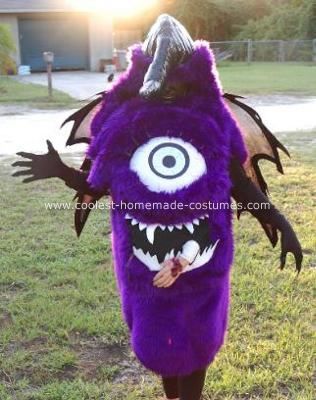 I got this One Eyed One Horned Flying Purple People Eater Costume idea from the song, obviously. It was a hit, although some people didn't know what it One Eyed One Horn Flying Purple People Eater Costume, Flying Purple People Eater Costume, Purple People Eater Costume, Flying Purple People Eater, Sheb Wooley, Purple People Eater, Monster Costume, Alien Halloween, Purple People