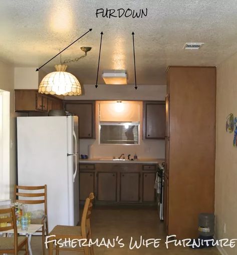 Fur down is the wall over your cabinets. Many people call it soffit but I was corrected when using that term and was told the construction term is fur down. You learn something new everyday. Some of you might have an empty space between the cabinets and ceiling. We had that before and I decorated it with cute little items that collected dust and got kind of greasy and gross after being there a while. If we had purchased new cabinets, I would have removed the fur down and had our cabine… Kitchen Decor Above Cabinets, Decorating Above Cabinets, Diy Floors, Space Above Kitchen Cabinets, Kitchen Soffit, Decor Above Cabinets, Kitchen Cabinets Diy, Above Kitchen Cabinets, Above Cabinets