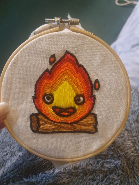 My completed Calfier, from Howl's moving castle!😍 #studioghibli #howlsmovingcastle #calcifer #embroidery #newbie Calcifer Embroidery, Howls Moving Castle Embroidery, Totoro Cross Stitch, Castle Embroidery, Anime Cross Stitch, Miyazaki Anime, Howl's Moving Castle, Animated Love Images, Howls Moving Castle