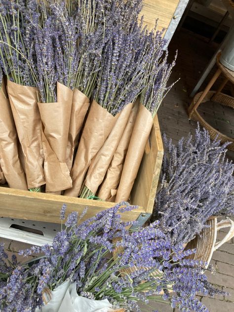 This pin shows some pretty purple lavender bouquets wrapped in paper, layered in wooden baskets. The picture looks very aesthetically pleasing. Wooden Baskets, Lavender Bouquets, Bouquet Wrapping, Lavender Bouquet, Wooden Basket, Nature Dress, Flower Business, Bouquet Wrap, Lavender Farm