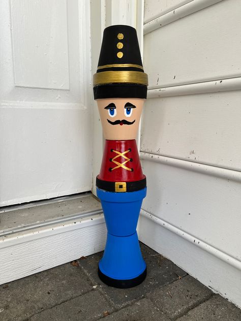 A friend gave me some mini terracotta pots and I knew I wanted to try a smaller scale version of the Terracotta Pot Nutcracker I had seen other people make. He’s about 22” tall and would even fit on the fireplace mantle. Flower Pot Nutcracker, Christmas Room Decor, Christmas Room, Craft Day, Fun Diy Crafts, Fireplace Mantle, Terracotta Pots, Nutcracker, Christmas Deco