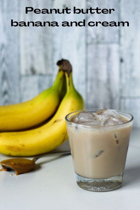 This peanut butter banana and cream cocktail combines some of my most favorite liqueurs for a delicious drink that tastes like a dessert but beware! This drink contains 4 shots of alcohol and nothing else. Peanut Butter Whiskey, Irish Cream Coffee, Moonshine Recipes, Irish Cream Liqueur, Whiskey Drinks, Banana Cream, Peanut Butter Banana, Irish Cream, Most Favorite