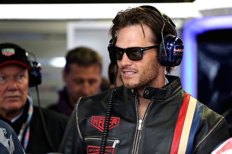 Patriots quarterback Tom Brady in the Red Bull Racing garage during the Canadian Formula One Grand Prix in Montreal. Tom Brady Long Hair, Tom Brady Photos, Tom Brady Patriots, Canadian Grand Prix, New England Patriots Football, Gilles Villeneuve, Patriots Fans, Julian Edelman, Boston Strong