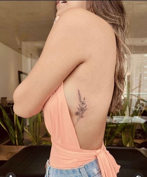 Back Tiny Tattoo Women, Best Places For Hidden Tattoos For Women, Flowers On Side Tattoo, Upper Ribcage Tattoo, Botanical Rib Tattoo, Women Ribcage Tattoo, Nature Tattoos Back, Large Wrist Tattoos For Women, Wildflower Rib Tattoo