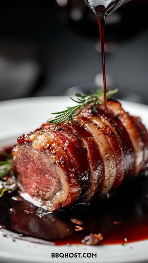 Add a savory twist to your Christmas party dinner menu with this Bacon-Wrapped Beef Tenderloin. Crispy bacon wraps around juicy beef for a flavor explosion. Save this now and click for more beef tenderloin recipes! Beef Tenderloin In The Oven, Tenderloin With Red Wine Sauce, Slow Roasted Beef Tenderloin, Tenderloin In The Oven, Crusted Beef Tenderloin, Slow Roasted Beef, Bacon Wrapped Tenderloin, Roasted Beef Tenderloin, Bacon Wrapped Beef