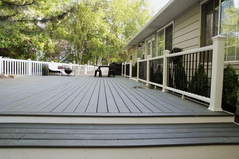 Our Finished Deck! - Chris Loves Julia Trex Clam Shell Deck, Sloping Landscape, Deck Stains, Outdoor Deck Design, Deck Rails, Deck Design Ideas, Platform Deck, Deck Stain, Deck Remodel