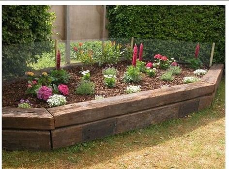 Railroad Ties Landscaping: Everything You Need to Know Railroad Ties Landscaping, Flower Garden Layouts, Railroad Ties, Front Yard Decor, Garden Railroad, Raised Patio, Raised Flower Beds, Landscaping Retaining Walls, Garden Borders