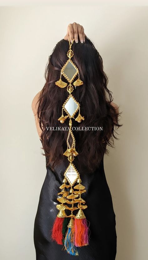 Beautiful Punjabi Paranda with a modern twist. Adorned with beautiful mirrors, gota and gold pom poms. This paranda sits on top of the braid like hair jewelry instead of braiding with your hair.  Style Tip: Wear with a traditional Patiala salwar suit or with a trendy palazzo suit. If you are a trendsetter this paranda would be a perfect hair accessory to wear with your western outfits such as a little black dress to make a fashion statement. Please feel free to contact us if you have any questio Paranda Hairstyle Punjabi, Mirror Latkan, Punjabi Paranda, Indian Hair Jewelry, Mehendi Event, Indian Hair Accessories, Hair Accessories Braids, Punjabi Jewelry, Hanging Tassels