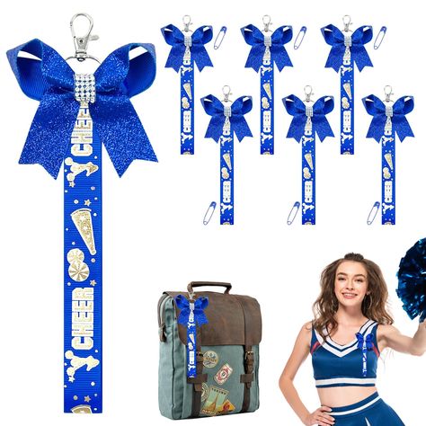 PRICES MAY VARY. THE RIGHT QUANTITY AND BEAUTY - Each pack includes 6 delicate blue cheerleader bow keychains and 6 pins, the right quantity is tailored for bulk users to choose as needed, the cheerleader keychains have a glossy finish with a shimmery finish that adds decorative charm to the keychains. FUN BACKPACK ACCESSORY - Our cheerleader keychains are the ideal decoration for any backpack, these glitter bow keychains have an eye-catching appearance that creates a cheerful atmosphere, a grea Cheer Pom Pom Holder For Backpack, Cheerleader Keychains, Cheerleading Keychains, Cheer Nationals Gifts, Cheer Keychain, Cricut Materials, Cheer Crafts, Keychain Business, Cheer Squad Gifts