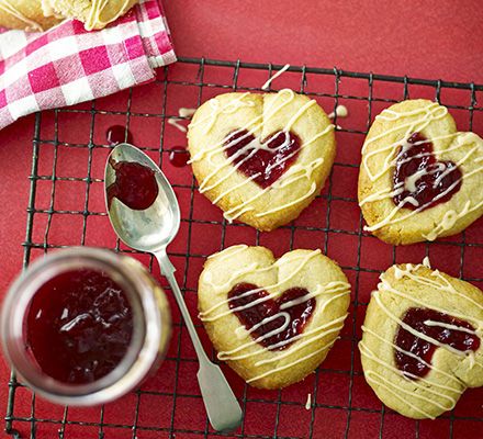 Cook from the heart and serve these raspberry-centred biscuits to kids, young and old- you don't need a special cutter, either Valentines Recipe, Heart Biscuits, Valentine Food, Valentines Baking, Biscuit Recipes, Children's Activities, Valentines Food, Heart Cookies, Bbc Good Food Recipes