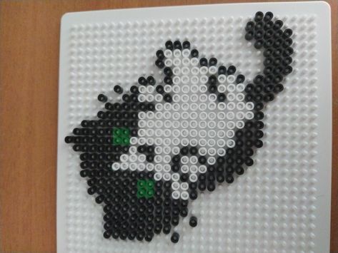 It's a black and white pyssla cat Black And White Cat Perler Beads, Tuxedo Cat Perler Beads, Grid Ideas, Pixel Grid, Pearl Beads Pattern, Diy Perler Bead Crafts, Diy Perler Beads, Iron Beads, Pixel Art Pattern