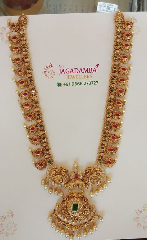 22 Carat gold antique mango haram with peacock pendant studded with rubies, emeralds, polki diamonds and pearls by Jagadamba jewellers. Mango Mala, Haram Designs, Gold Haram, Desi Outfits, Mala Jewelry, Antique Gold Jewelry Indian, Temple Jewelry, Gold Jewelry Simple Necklace, Jewelry Designing