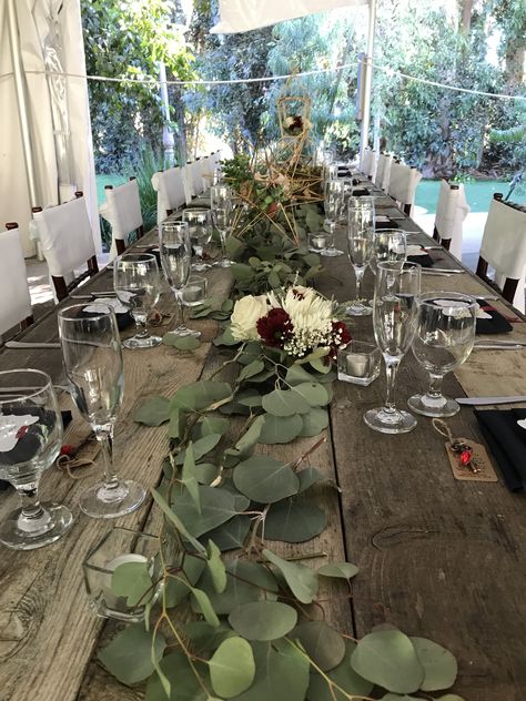 Loose eucalyptus leaves on farm tables Loose Eucalyptus On Table, Farm Tables, Eucalyptus Leaves, Farm Table, Wedding Florals, Wedding Floral, Wedding Stuff, Floral Wedding, Table Settings