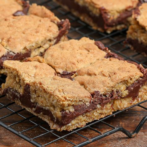 Gluten Free Oatmeal Chocolate Revel Bars Chocolate Revel Bars Recipe, Revel Bars Recipe, Chocolate Revel Bars, Chewy Oatmeal Bars, The Salty Cooker, Revel Bars, Oatmeal Cookies Chewy, Gluten Free Oatmeal, Caramel Fudge