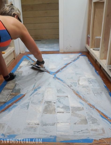 Wood Floor with Tile Inlay Wood Floor With Tile Inlay, Porcelain Brick Tile, Wood Block Flooring, Tile Inlay, Inlay Flooring, Sawdust Girl, Wood Floor Bathroom, Picture Frame Wood, Foyer Flooring