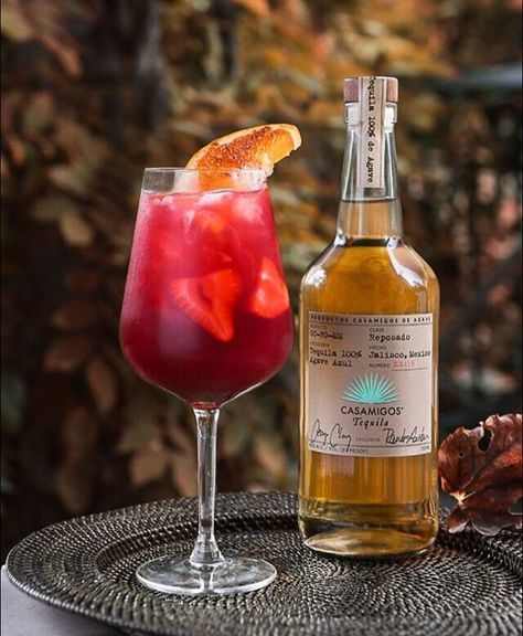 CASA SANGRITA  1.5 oz. #Casamigos Reposado 1.5 oz. Red wine (Malbec or full cabernet) 1 oz. Cane Sugar .5 oz. Fresh lemon juice .5 oz. Orange juice 2 Full strawberries 2 Orange wedges  Combine all ingredients into tin shaker. Muddle fruit. Dry shake (no ice). Fine strain into large wine glass. Add fresh ice. Garnish with 4-5 thinly sliced strawberries and large thinly slice half orange wedge with cinnamon over top. #CasamigosCocktails Casamigos Reposado, Tequila Sangria, Tequila Drinks Recipes, Girly Drinks, Sliced Strawberries, Popular Cocktails, Grapefruit Soda, Orange Drinks, Orange Wedges