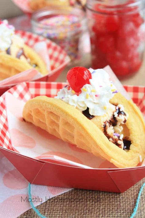 A finished ice cream taco in a paper serving bowl topped with whipped cream and a cherry Ice Cream Tacos, Cream Tacos, Waffle Taco, Ice Cream Taco, Dessert Taco, Ice Cream Kids, Waffle Ice Cream, Frozen Waffles, Sandwich Bar