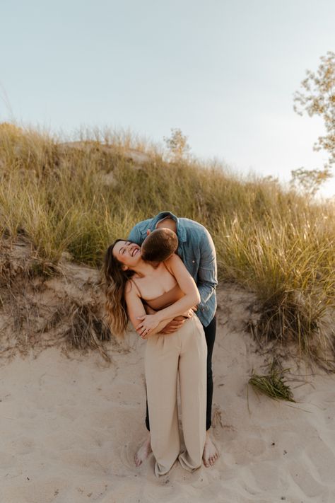 Indiana Dunes National Park Engagement Photos on the Beach with Neutral Outfits and Summer Photo Inspo Indiana Dunes Photoshoot, Engagement Photos On The Beach, Dunes Photoshoot, Beach Couples Photoshoot, National Park Engagement Photos, Indiana Dunes National Park, Park Engagement Photos, Indiana Dunes, Neutral Outfits