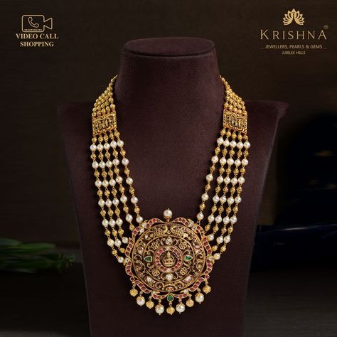 Video Call Shopping Available! +91-8499011111 - Shopping made easier with Krishna Jewellers Pearls & Gems, Jubilee Hills. This gorgeous long haram necklace is a traditional bridal jewellery that is worn by many modern day Indian brides. It is simple yet elegant, and can be worn on its own or paired with other Indian wedding jewellery pieces such as earrings or any gold nose pin . Krishna Jewellers Hyderabad, Elegant Gold Necklace, Fashion Jewelry Necklaces Gold, Traditional Wedding Jewellery, Long Haram, Gold Pearl Jewelry, Antique Necklaces Design, Indian Bridal Jewelry Sets, Bridal Jewellery Design