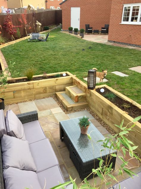 Sunken Patio, Railway Sleepers, Indian Sandstone Paving. Larissa James Landscaping Sloped Garden Seating Area, Backyard Sunken Seating, Sunken Garden Ideas Seating Areas, Sunken Area In Garden, Indian Sandstone Patio With Sleepers, Sloped Garden Patio Ideas, Sunken Patio Ideas Retaining Walls, Patio And Sleepers, Backyard Sunken Patio