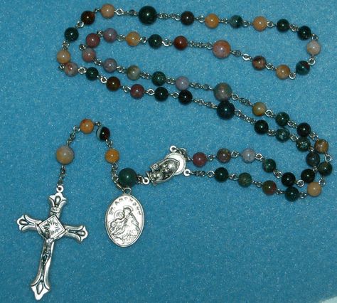 Instruction to make an heirloom quality Rosary with eye pins and chain. This example uses Sterling Silver parts & pieces, with glass beads, totalling $60 (incl. shipping). Makes a unique, heartfelt, and lasting gift. A more utilitarian (but still pretty) version can be made using base metal parts & pieces for under $20 (incl. shipping).See some of the rosaries I've made at http://kqrpnb.googlepages.com/rosariesFeatured 10/29/09 - Welcome new viewers!-=- Make A Rosary, Single Diamond Necklace, Diamond Necklace Wedding, Rosary Jewelry, Gold Rosary, Crown Necklace, Catholic Jewelry, Rosary Bracelet, Rosary Necklace