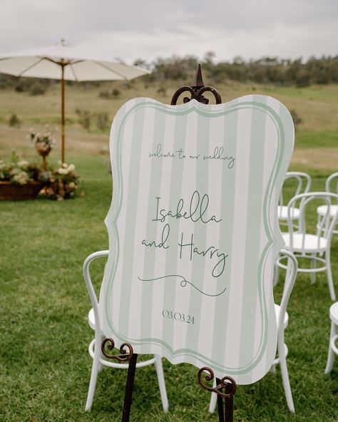 This vintage inspired welcome sign is bringing all of those Bridgerton vibes. Those soft mint stripes paired with the script font and ornate shape bring romance and softness to the day. Paired with the perfect easel and you have yourself a garden wedding fit for the queen! Garden Wedding Signs, Garden Party Wedding Signage, Garden Wedding Welcome Sign, Whimsical Wedding Signage, Vintage Wedding Details, Vintage Garden Party Wedding, Garden Wedding Signage, Easel Welcome Sign, Vintage Welcome Sign