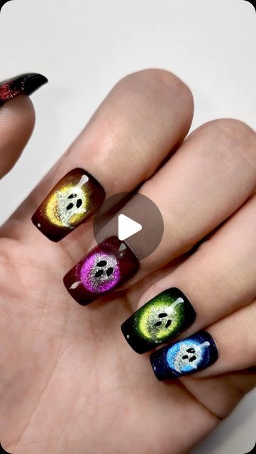 Nail art 💅 Manicure on Instagram: "👻✨ Embrace the cuteness of Halloween adorable ghostly nails! Perfect for adding a fun and playful vibe to your spooky season look🎃 🛒Products Used: 🛍️Shiny Platinum Cat Eye Gel 🛍️Halloween Carnival Neon Cat Eye 🔗Link in bio 🫶  #CuteGhostNails#HalloweenNailArt#SpookyButCute#GhostlyVibes#HalloweenFun#2024Halloween#fpy#cateye" Cat Eye Nails For Halloween, Halloween Cat Eye Nails, Cateye Nailart, Ghost Nails, Neon Cat, Nail Design Video, Nails Arts, Cat Eye Gel, Cat Eye Nails